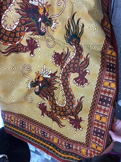 Indian-made capulana with a Chinese dragon motif