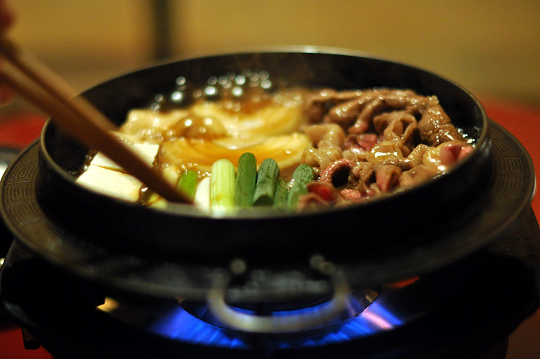 Figure 7. Bowl of sukiyaki on grill