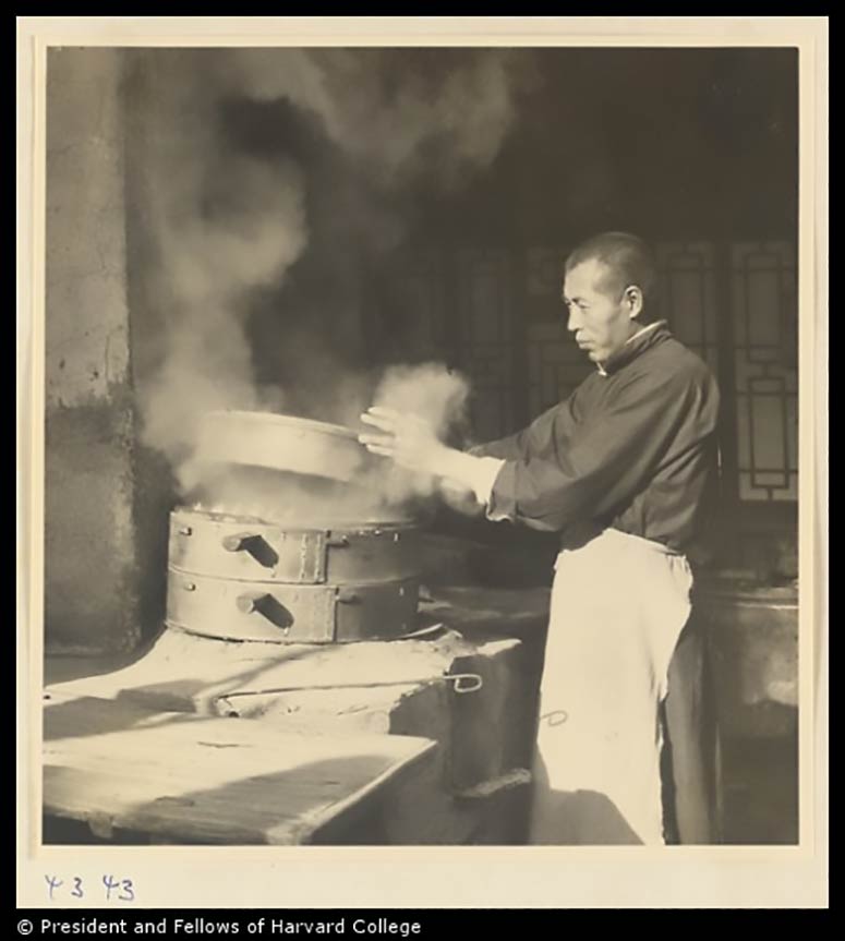 Cook opening a steamer