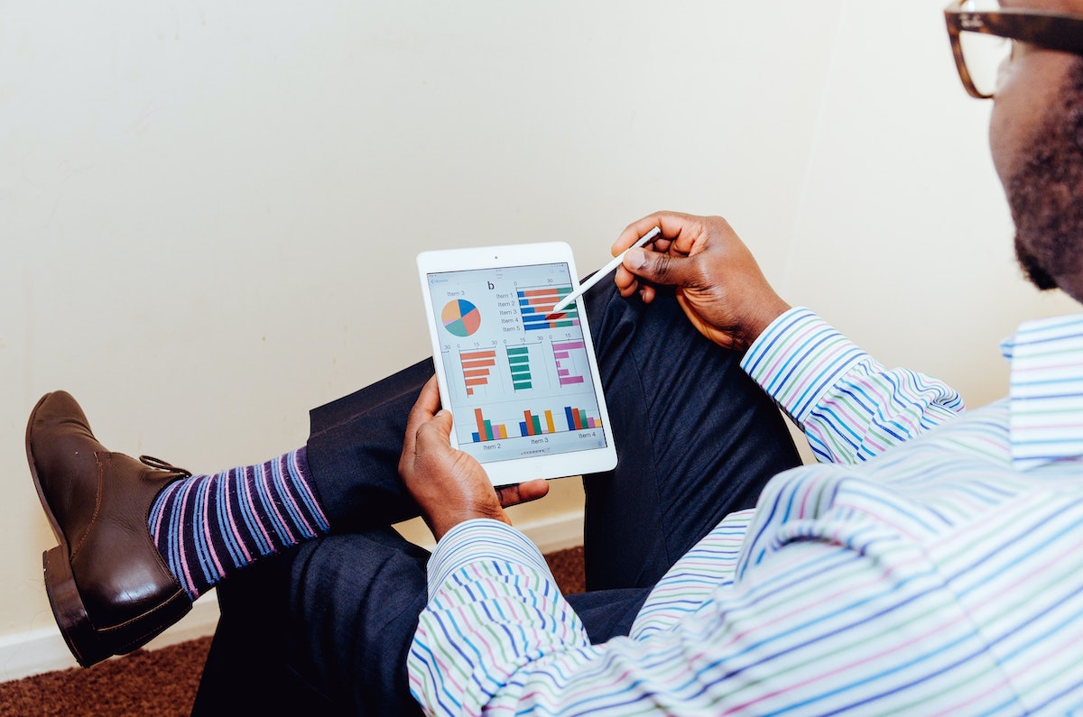 Person using a tablet spreadsheet